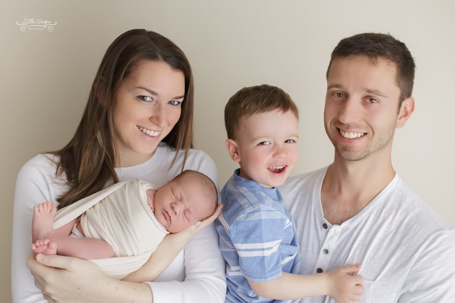 family with newborn baby, newborn photographers
