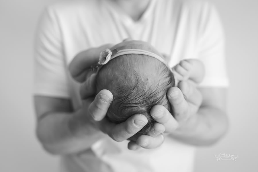 ottawa newborn photographers, baby in dad's hands